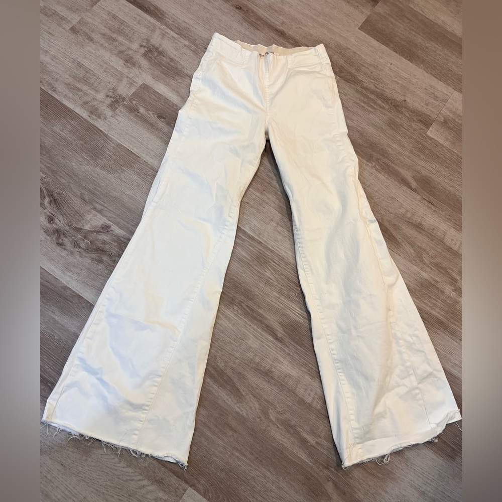We the Free raw hem, flare, pull in jean, size 27